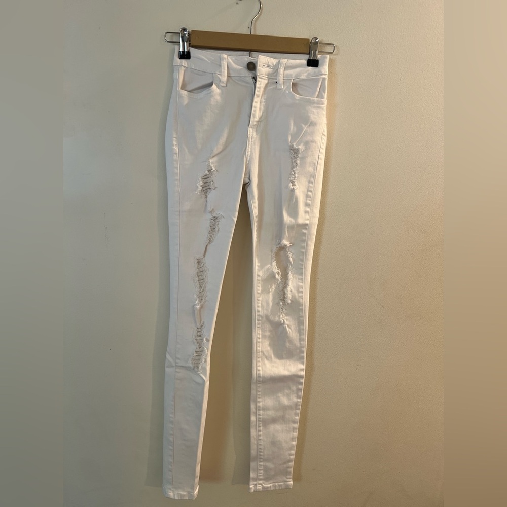 Fashion Nova White Skinny Jeans with Distressed Detailing